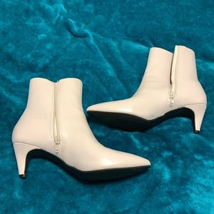 White heeled boots.